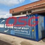 A blue shipping container with CMA CGM logo and text.
